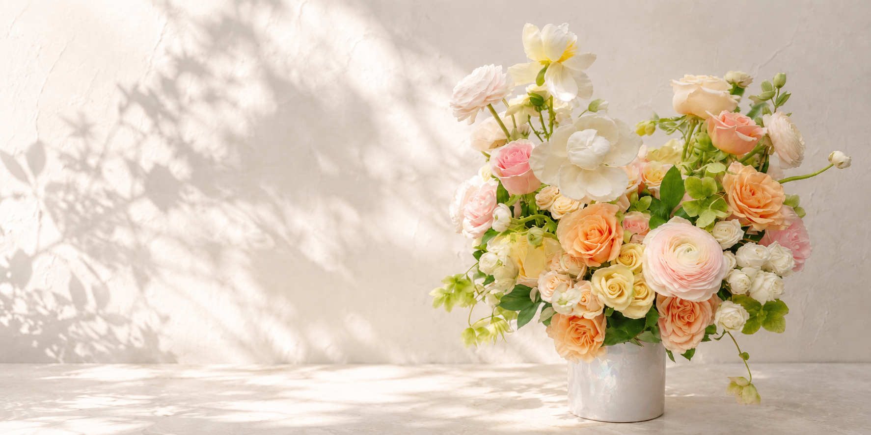 Pastel Tone floral arrangement in white vase