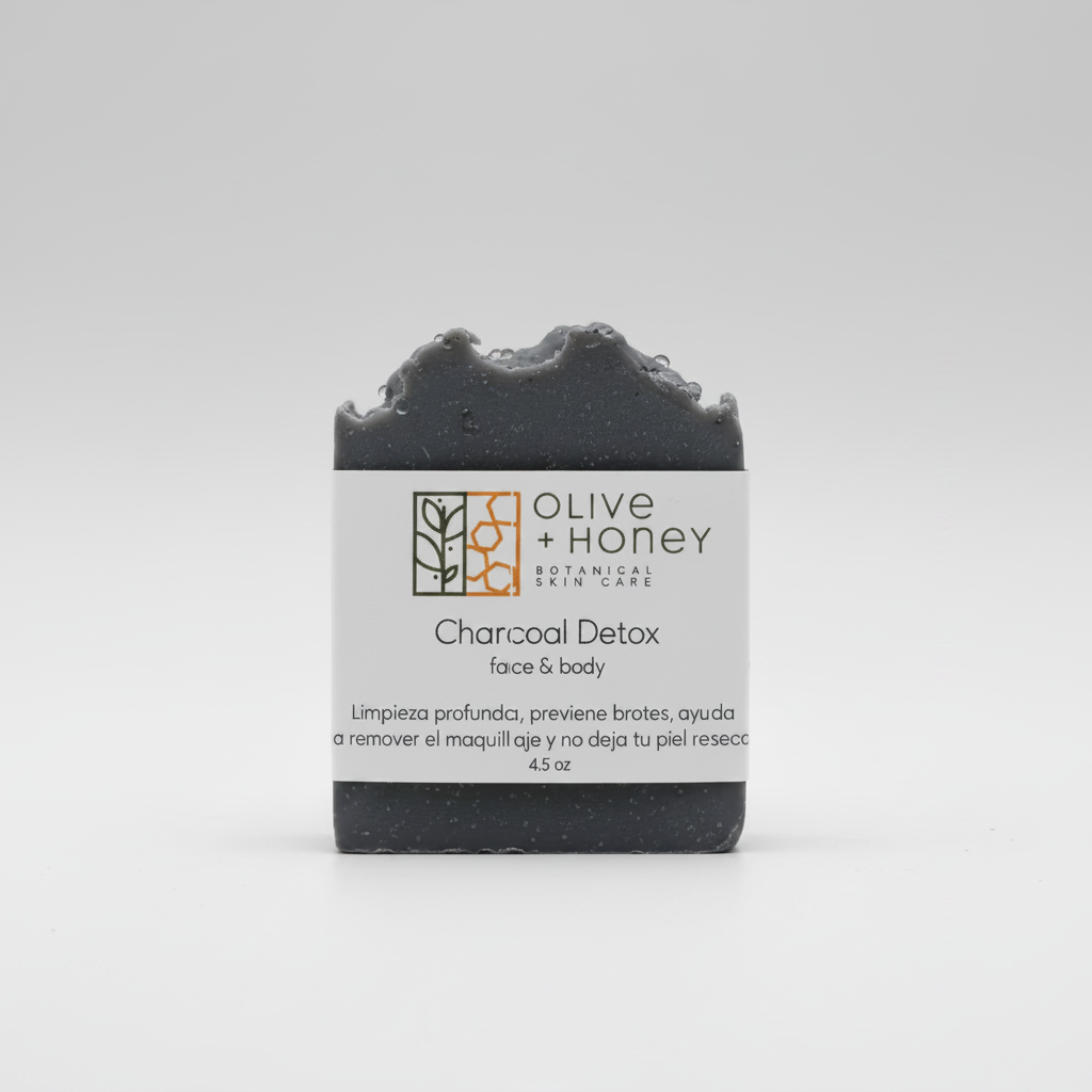 Olive + Honey Charcoal Detox soap on light gray seamless backdrop